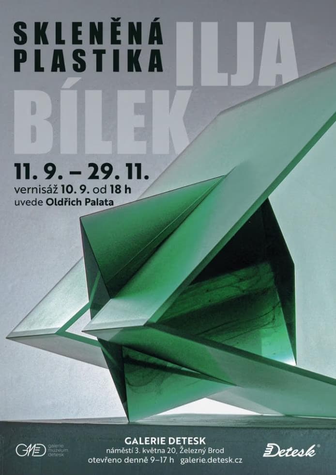 An exhibition poster features a geometric green glass sculpture against a grey background.