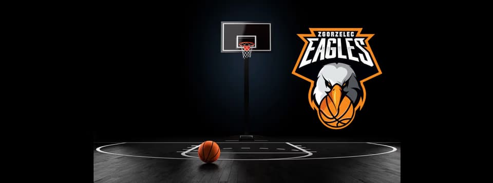 Zgorzelec Eagles basketball team logo over a court with a hoop and ball against black.