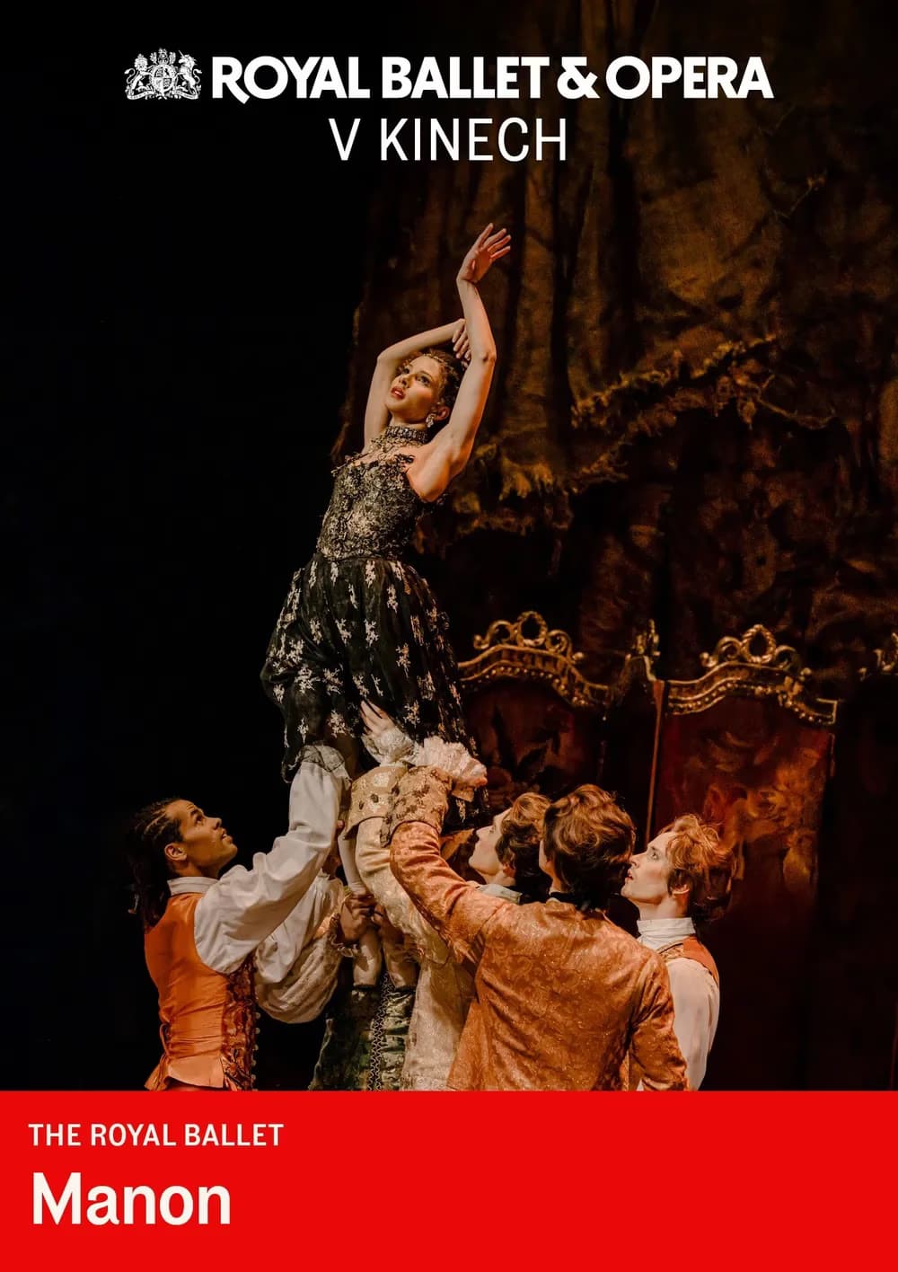 Ballerinas lift a woman in an ornate dress during a Royal Ballet performance of Manon.