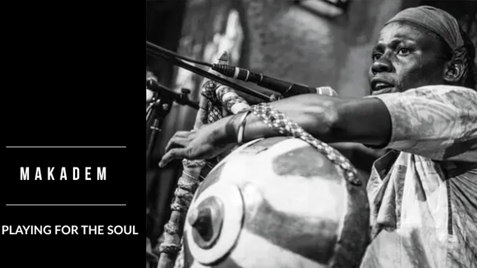 Black and white photo of musician Makadem playing a traditional instrument with text on side.