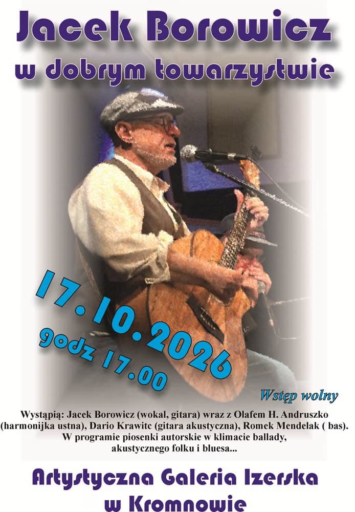 Hudebník s kytarou vystupuje na pódiu, doprovázen textem propagujícím koncert v Kromnowě.