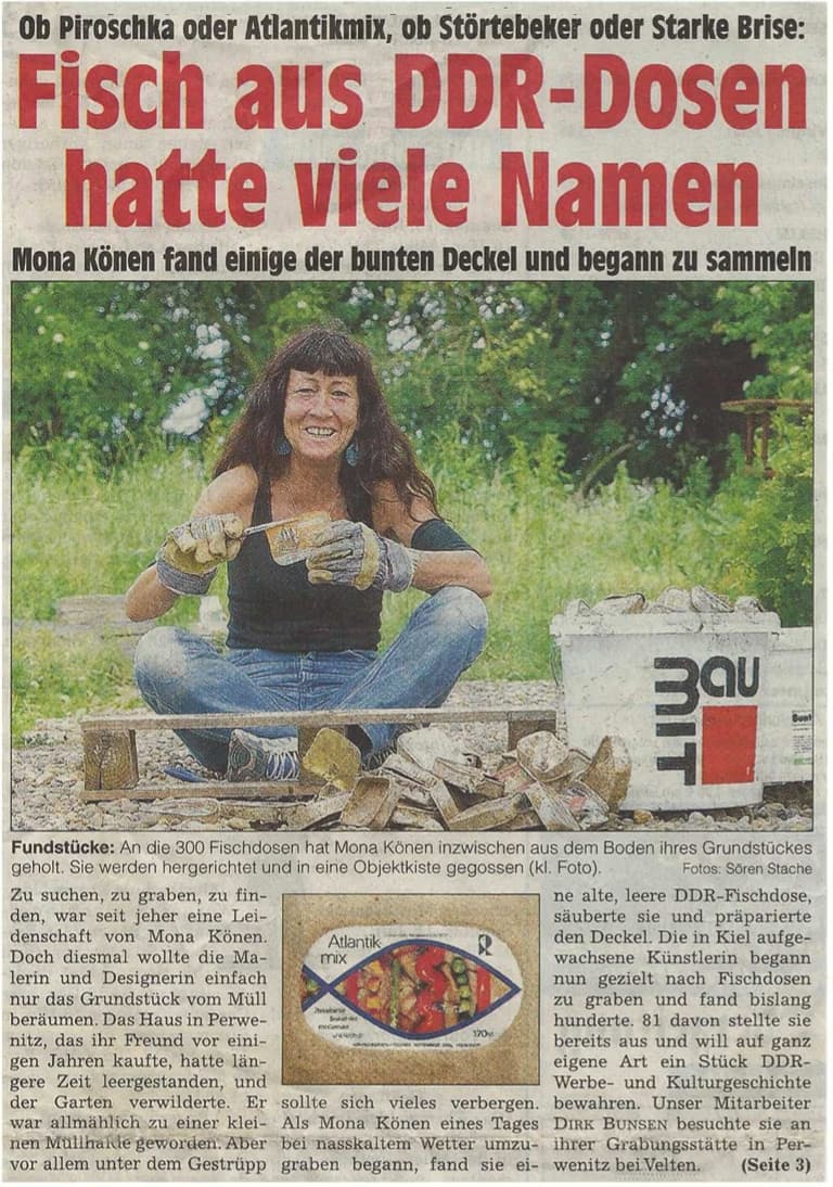 A woman sits outdoors digging up and cleaning antique East German fish can lids from the soil.