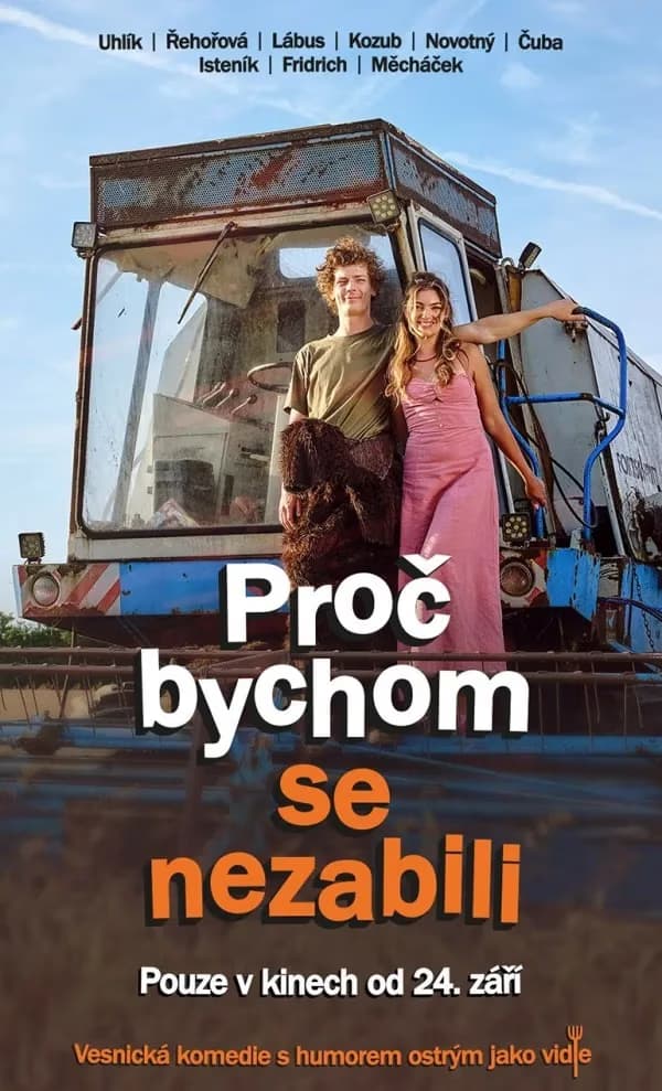Young couple posing in front of a combine harvester on a sunny field.