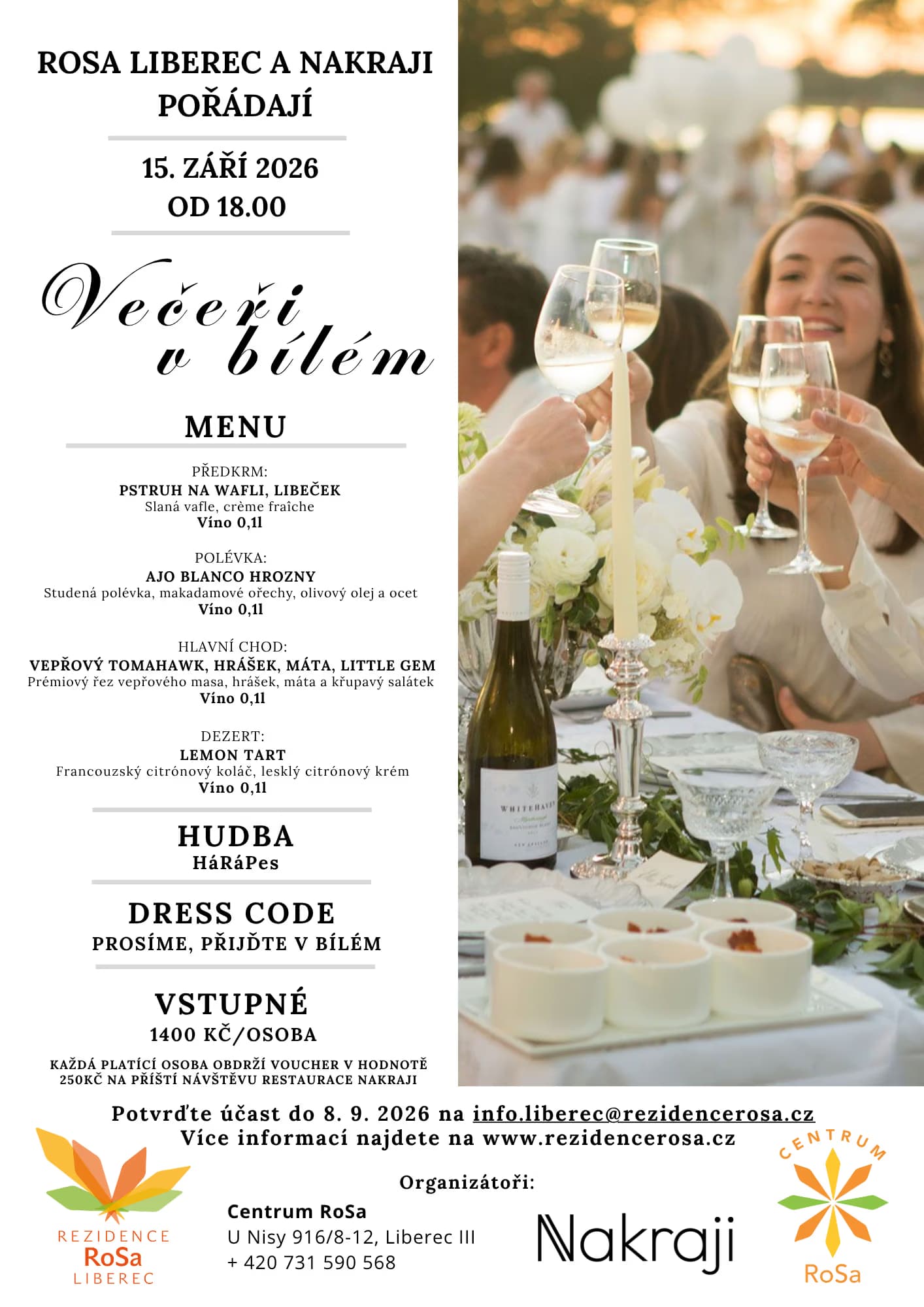 People toast with wine glasses at a dinner table during a formal outdoor event.