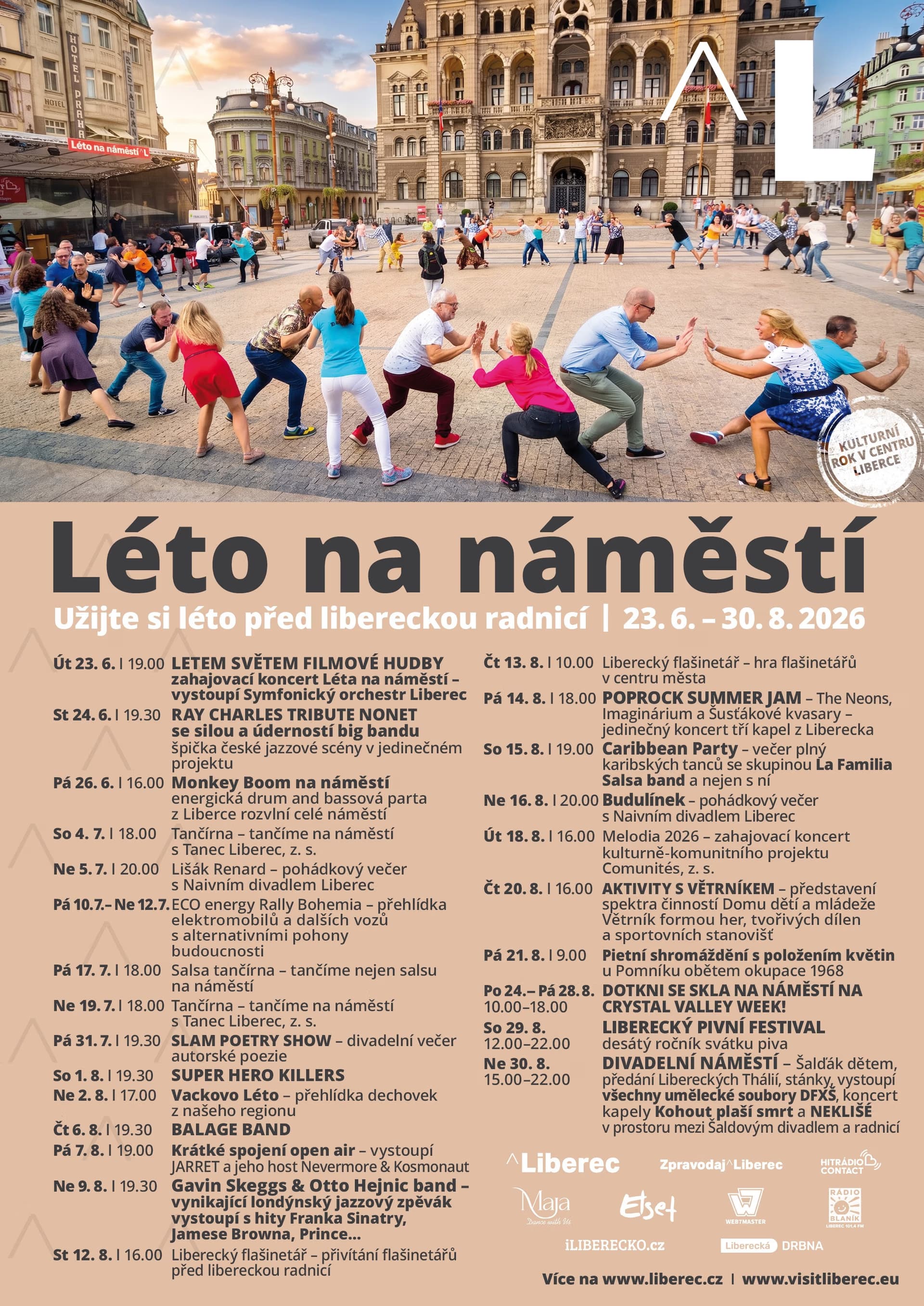 People participate in a group dance on the square in front of the Liberec town hall.