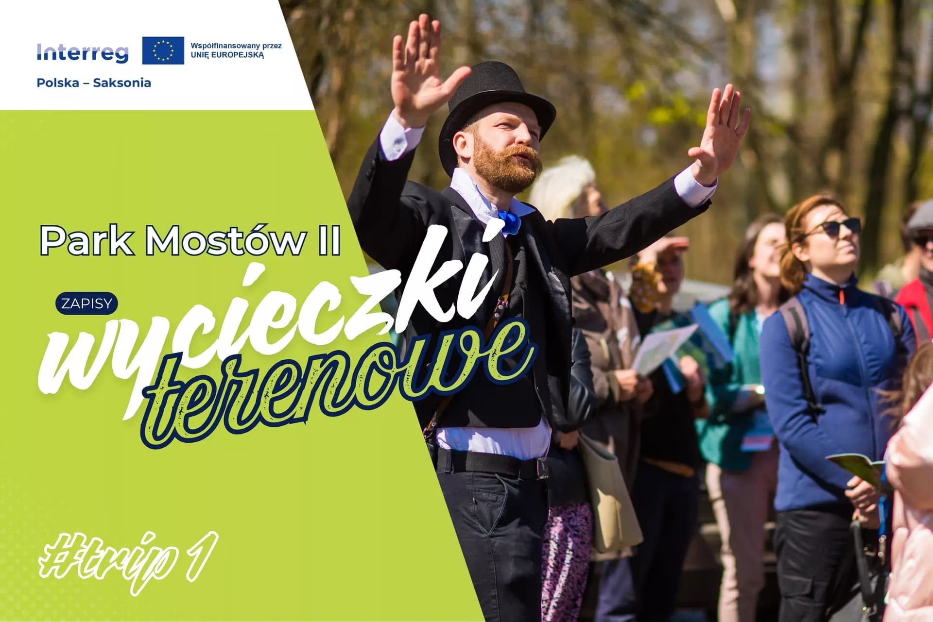 A man in a top hat gestures to a group of people listening during a park excursion.