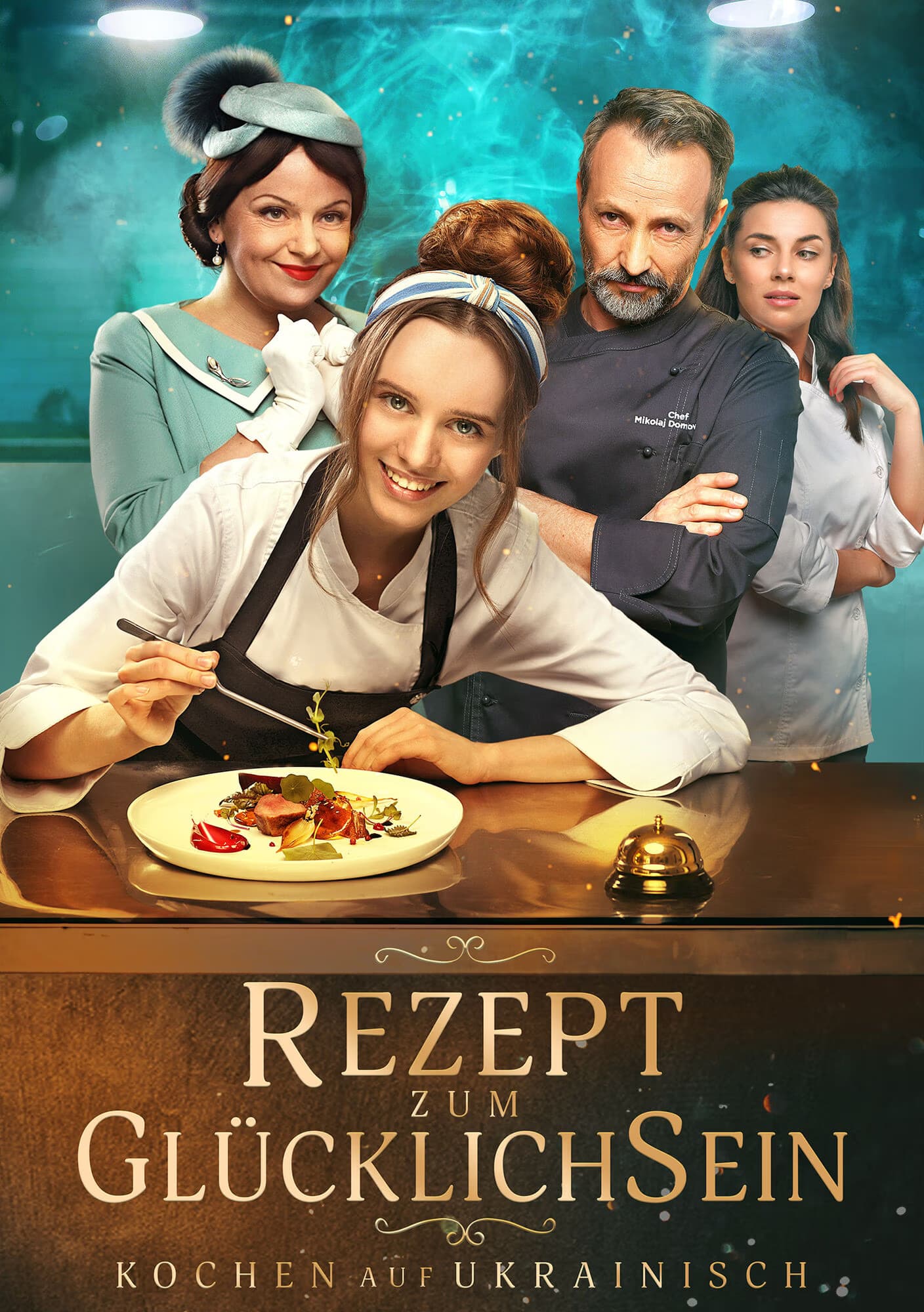 Four chefs and restaurant staff pose behind a kitchen counter with a plated meal.