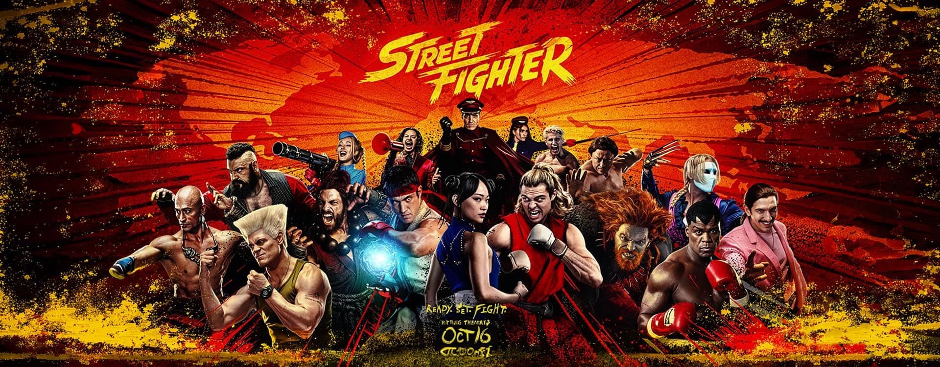 Street Fighter characters gather against a fiery orange background in this promotional poster.